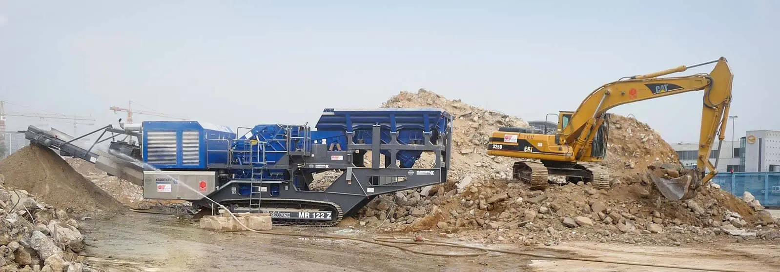 Bauschuttaufbereitung auch direkt vor Ort Aufbereitung und Verwertung von Bauschutt auf Baustellen